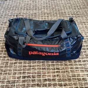 Patagonia Blue and Orange Duffel Bag with Convertible Carrying Options